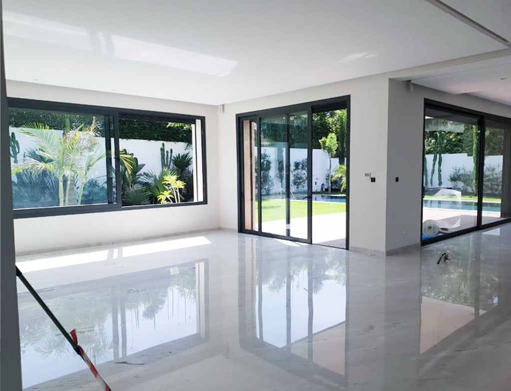 Menuiserie aluminium Strugal Tanger - fenêtres coulissantes villa